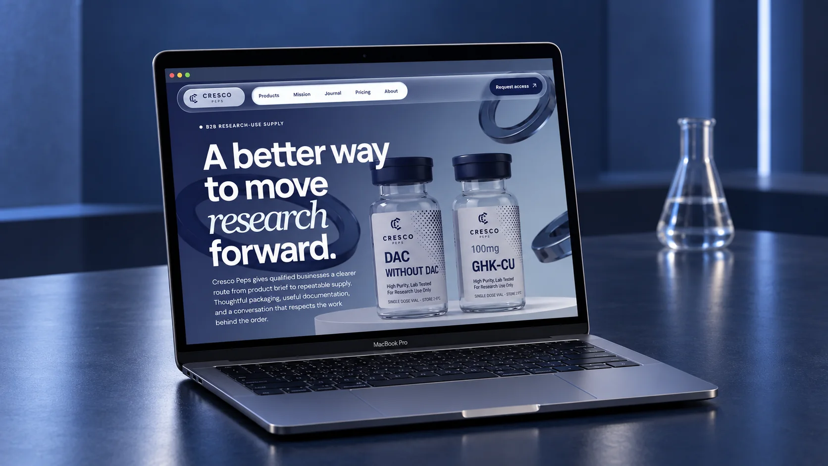 Cresco Peps website on a MacBook in a spacious navy laboratory setting
